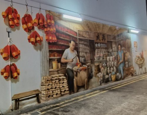Clog Maker wall Mural of by Yip Yew Chong in an alley connecting Smith St and Temple St.