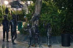 Statues of two men and three kids at the Latern Festival.