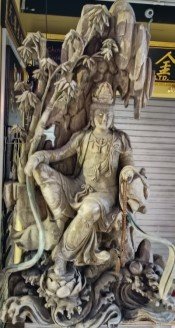 Statue of Diety across the road at South Bridge Rd and Smith St.