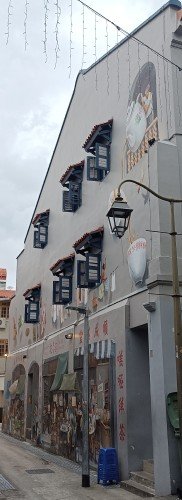 Wall Murals of Man pouring tea and Wet Market by Yip Yew Chong in alley connecting Temple St and Pagoda St.