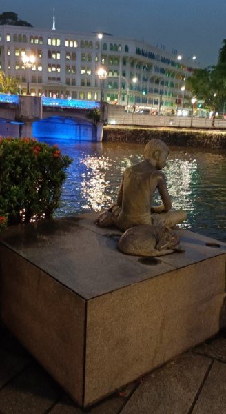 The Boy with his Dog statues by Unknown Artist.