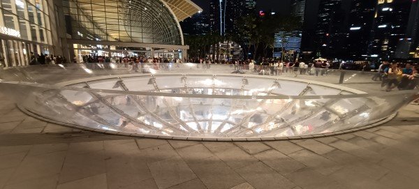 The Outside of the Toilet Bowl Flush actual name is RAIN OCULUS by Ned Kahn in 2010.