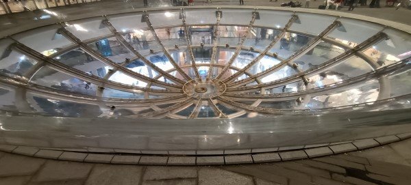 The Outside of the Toilet Bowl Flush actual name is RAIN OCULUS by Ned Kahn in 2010.