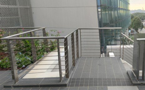 After crossing the overhead bridge to the Hotel side, either take the lift or go down the stairs to ground level.