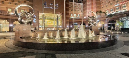 Water Fountain and the Harmony Sculpture by Prof Liu JiLin outside Ngee Ann City at 391A Orchard Rd.