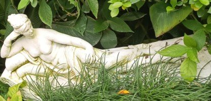  Statue of a Partially Naked Venus in The National Orchid Garden.