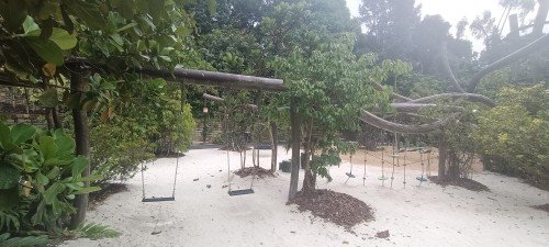 The Playground with swings and obstacle course at the Como Adventure Grove.