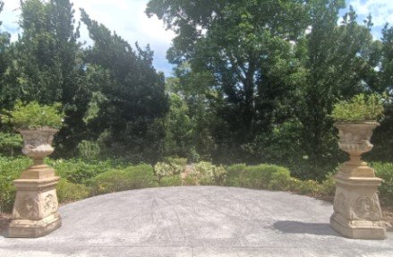 Pair of Ancient Looking Vases at Sundial Garden by Unknown Sculptors.