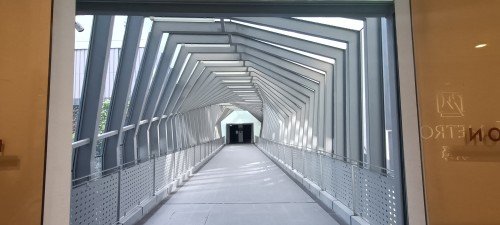 Paragon Mall Link Bridge starting from the Paragon side at Level 3 at 290 Orchard Rd.