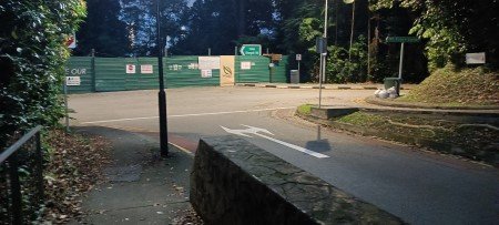 Walk down the pedestrian walkway to the intersection. 