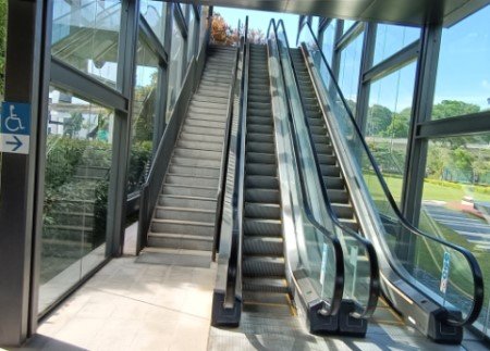 Go up the escalator to the Overhead Bridge.