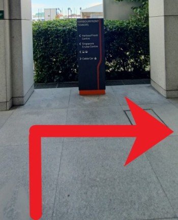 Walk towards the side of the building, turn right and walk straight.