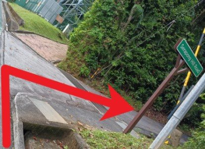 Continue walking and turn right into Serapong Hill Rd and walk up Fort Serapong.