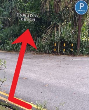 Turn right, cross the road and walk into the Tanjong Beach Entrance at Tanjong 2 Car Park.