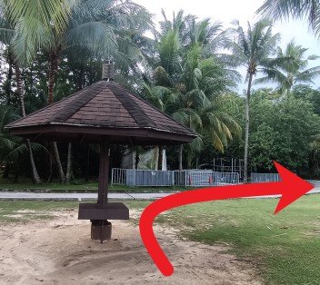 With your back facing the rocks walk straight past the shelter and turn right and follow the walkway.