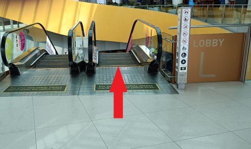 Go down two escalators to L1.