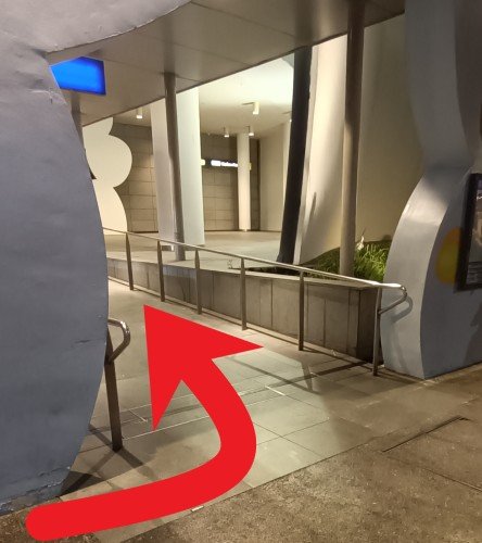 At the 14141 HarbourFront Stn/Vivocity bus stop, turn left at the opening and walk up the slope through the doors.