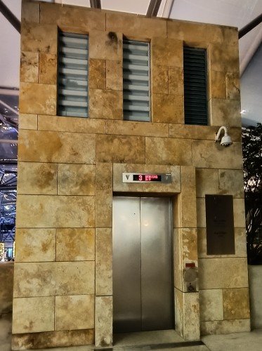 Take the escalator or elevator down to AVE8.