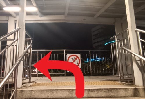  Turn left to cross the overhead bridge.